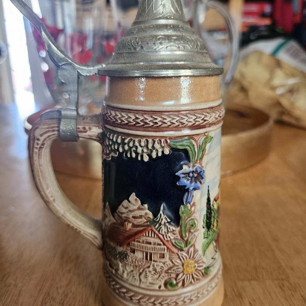 Handcrafted Ceramic Alpine Stein with Blue and Brown Scenic Relief